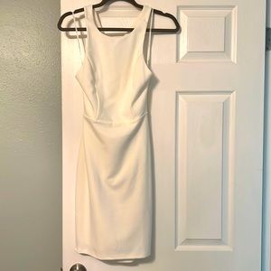 Cute white cross back dress. Only worn once for bachelorette party!